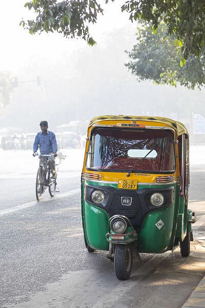 Tuk-Tuk and cyclist, New Delhi, India