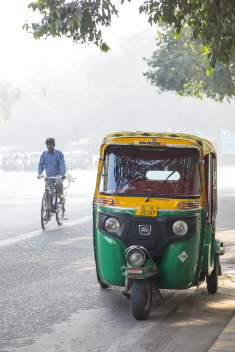 Framed Print : Tuk-Tuk and cyclist, New Delhi, India Framed Print : Tuk-Tuk and cyclist, New Delhi, India