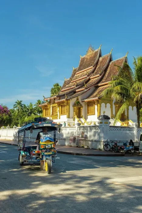 Framed Print : Tuk-Tuk & Haw Pha Bang temple, Luang Prabang (ancient capital of Laos on the Mekong river), Laos Framed Print : Tuk-Tuk & Haw Pha Bang temple, Luang Prabang (ancient capital of Laos on the Mekong river), Laos