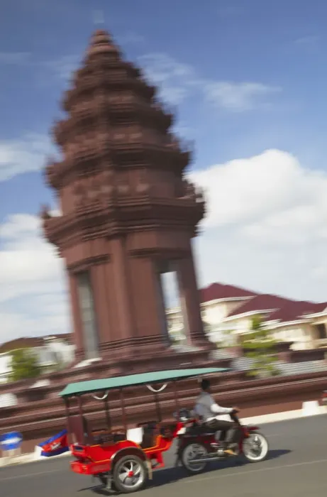 Framed Print : Tuk tuk passing Independence Monument, Phnom Penh, Cambodia Framed Print : Tuk tuk passing Independence Monument, Phnom Penh, Cambodia