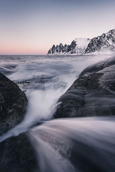 Tungeneset and the Okshornan Peaks during a winter sunrise, Senja Island, Norway