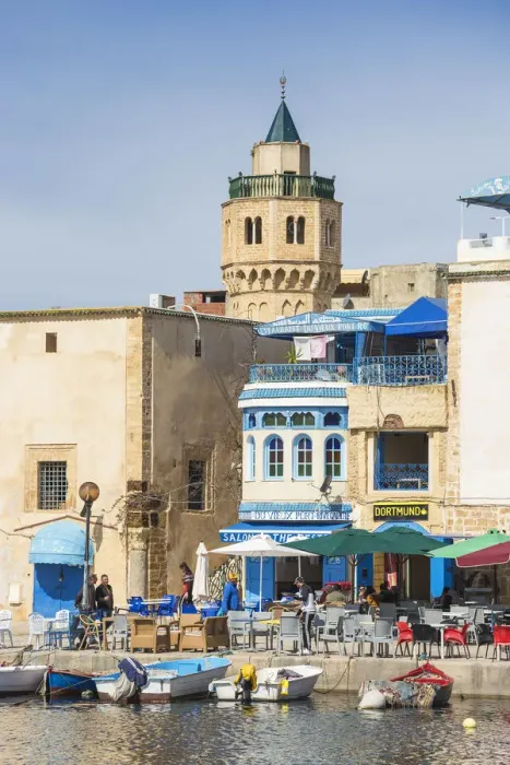 Framed Print : Tunisia, Bizerte, Cafes and Kasbah mosque at the old port
