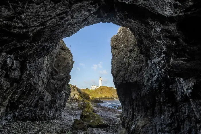 Framed Print : Turberry Lighthouse from within a coastal cave, Turnberry Point, South Ayrshire, Scotland, April 2024 Framed Print : Turberry Lighthouse from within a coastal cave, Turnberry Point, South Ayrshire, Scotland, April 2024