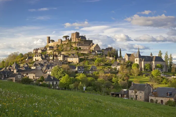 Framed Print : Turenne village labelled a plus beau village de France with spring flowers, Turenne Framed Print : Turenne village labelled a plus beau village de France with spring flowers, Turenne