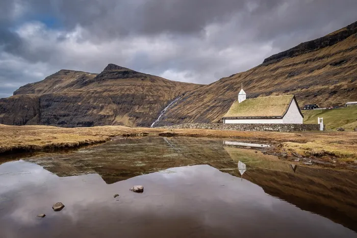 Framed Print : Turf roofed Saksun church reflected in a pond, Streymoy, Faroe Islands, Denmark, Europe Framed Print : Turf roofed Saksun church reflected in a pond, Streymoy, Faroe Islands, Denmark, Europe