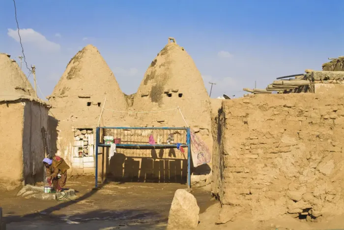 Framed Print : Turkey, Eastern Turkey, Harran, Bed outside Traditional mud brick Beehive houses Framed Print : Turkey, Eastern Turkey, Harran, Bed outside Traditional mud brick Beehive houses