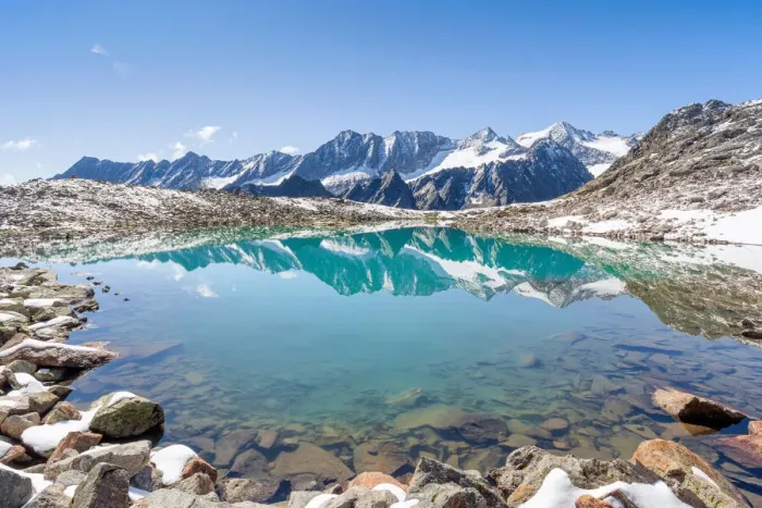 Framed Print : The turquoise Lake Rinnensee reflecting the Glaciers of the Stubai Alps
