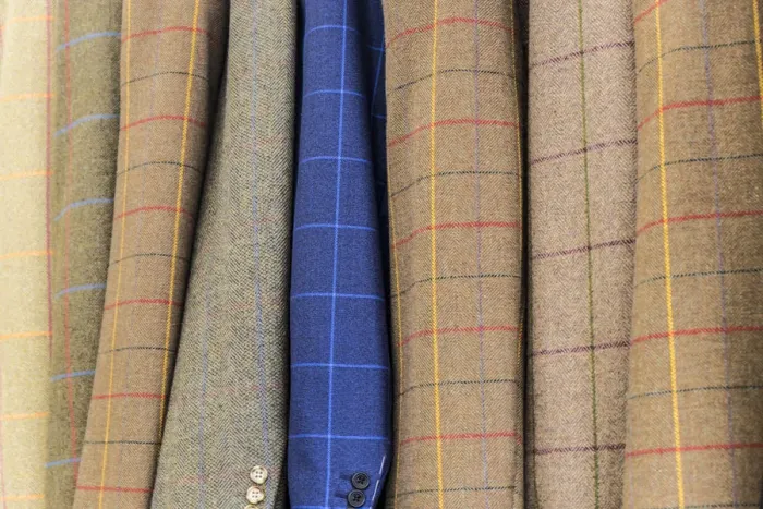 Framed Print : Tweed jackets on rail, UK Framed Print : Tweed jackets on rail, UK