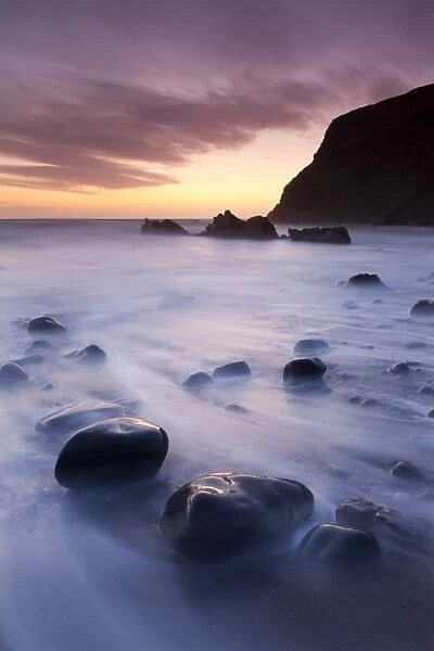 Twilight on the beach at Duckpool on the North Cornish Coastline, Cornwall, England