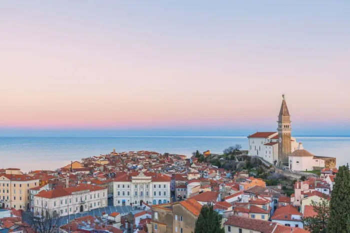 Framed Print : Twilight on the historic town of Piran with the church of St Framed Print : Twilight on the historic town of Piran with the church of St