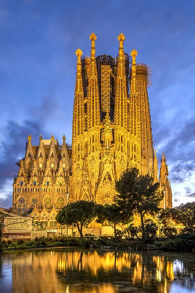 Twilight view over Nativity facade, Sagrada Familia basilica church, Barcelona, Catalonia