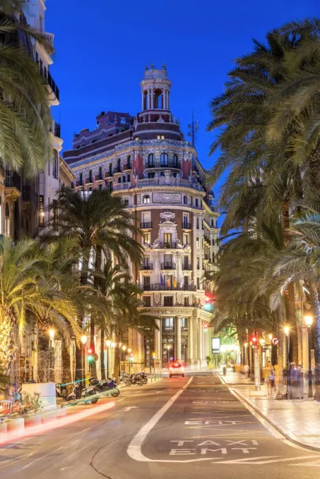 Framed Print : Twilight view of a street in the city center with the historical Banco de Valencia Framed Print : Twilight view of a street in the city center with the historical Banco de Valencia