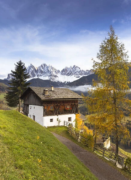 the typical alpine hut in Villnossertal with the Geisler Group in the background
