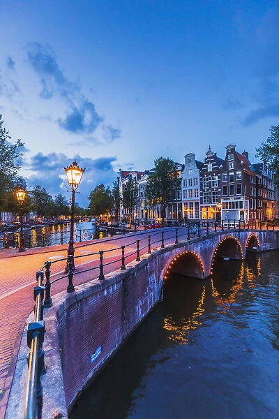 Typical buildings in Amsterdam at dusk, Holland  /  Netherlands