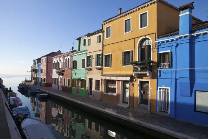 Framed Print : The typical Burano houses are mainly squared-shaped and are divided into two or three Framed Print : The typical Burano houses are mainly squared-shaped and are divided into two or three