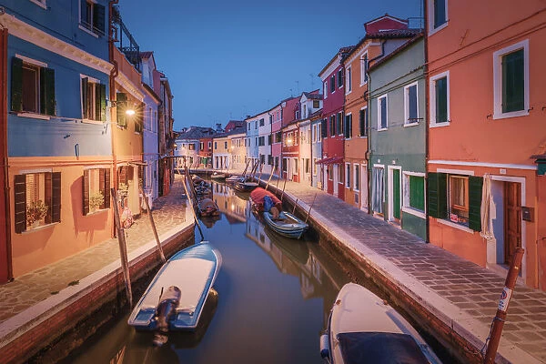 One of the typical canals of the island of Burano at evening, Laguna di Venezia, Venice
