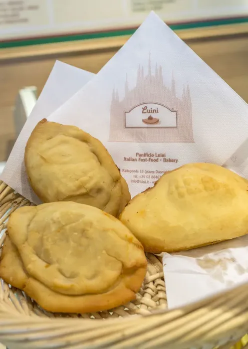 Framed Print : The typical milanese homemade Panzerotti at the old Luini bakery an icon of Milan