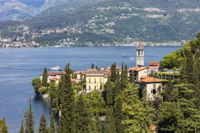 Framed Print : The typical village of Varenna surrounded by the blue water of Lake Como and gardens Framed Print : The typical village of Varenna surrounded by the blue water of Lake Como and gardens