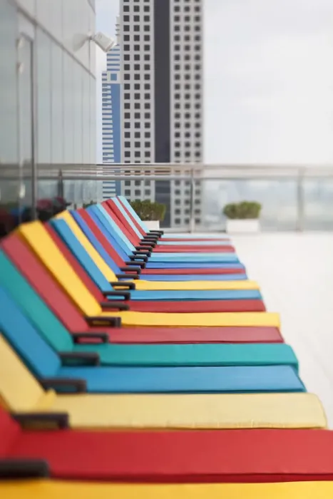 Framed Print : UAE, Dubai, colourful hotel loungers Framed Print : UAE, Dubai, colourful hotel loungers