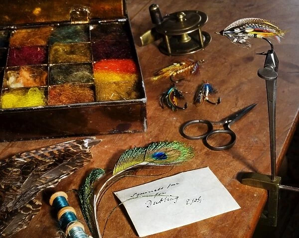 UK. Antique fly-tying equipment with a traditionally