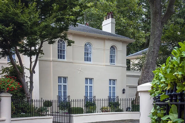 UK, England, London, Borough of Camden, early 19th Century Regency era neo-classical townhouses with stucco facades near Regents Park. Expensive real estate. No people