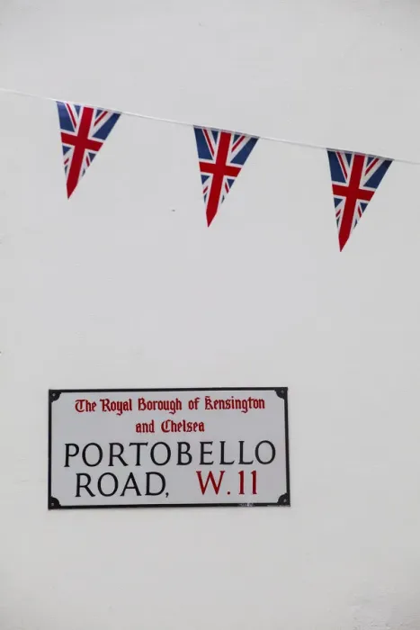 Framed Print : UK, England, London, Kensington, Union Jack bunting above Portobello Rd sign to celebrate Framed Print : UK, England, London, Kensington, Union Jack bunting above Portobello Rd sign to celebrate