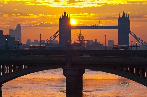 UK, England, London, Southwark Bridge and Tower Bridge at sunrise