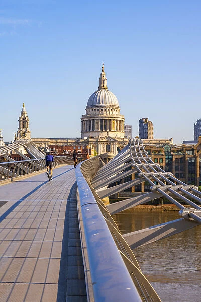 UK, England, London, St. Pauls Cathedral and Millennium Bridge over River Thames