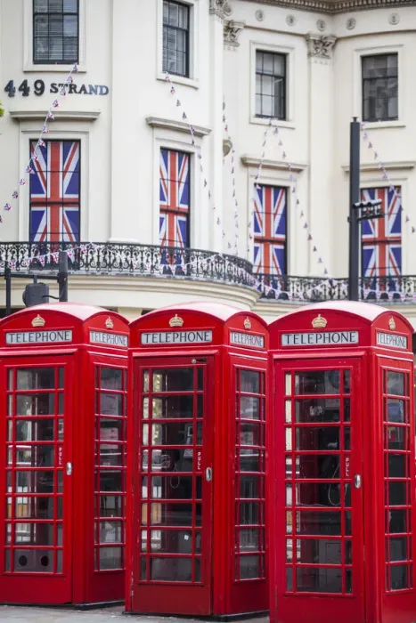 Framed Print : UK, England, London, The Strand, Red telephone box and Union Jack bunting to celebrate Framed Print : UK, England, London, The Strand, Red telephone box and Union Jack bunting to celebrate