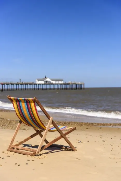 Framed Print : UK, England, Suffolk, Southwold, Southwold Beach and Pier, Deckchair Framed Print : UK, England, Suffolk, Southwold, Southwold Beach and Pier, Deckchair