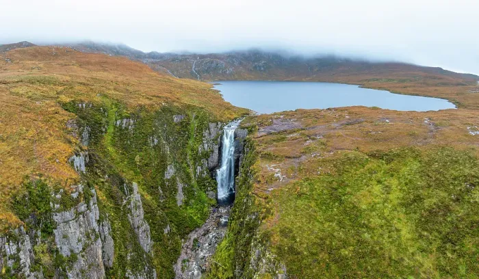 Framed Print : UK, Scotland, Highland, Sutherland, Assynt, Loch na Gainmhich and Allt Chranaidh Waterfall or Wailing Widows Waterfall, on the North Coast 500