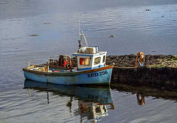 UK, Scotland, Highlands, Dornie, Fishing boat on the loch