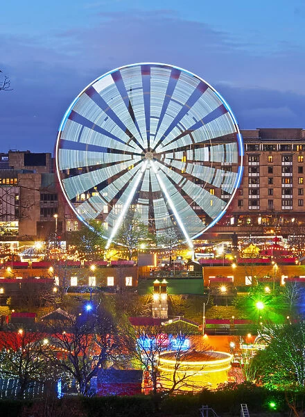 UK, Scotland, Lothian, Edinburgh, Twilight view of the Big Wheel on the Christmas