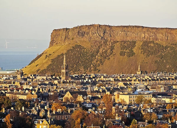 UK, Scotland, Lothian, Edinburgh, City Skyline with the Salisbury Crags viewed