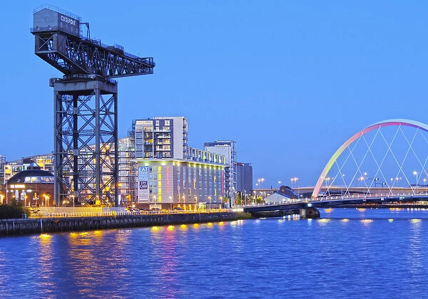 UK, Scotland, Lowlands, Glasgow, Twilight view of the Finnieston Crane and the Clyde Arc