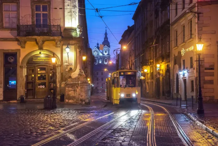Framed Print : Ukraine, Lviv, Electric Commuter Trolley, Medieval Cobblestone Streets