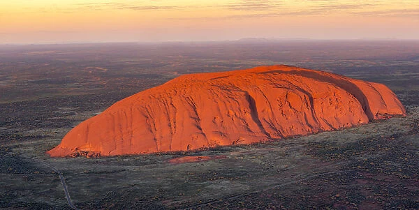 Uluru and Kata Tjuta at sunrise, Aerial view. Northern Territory, Australia
