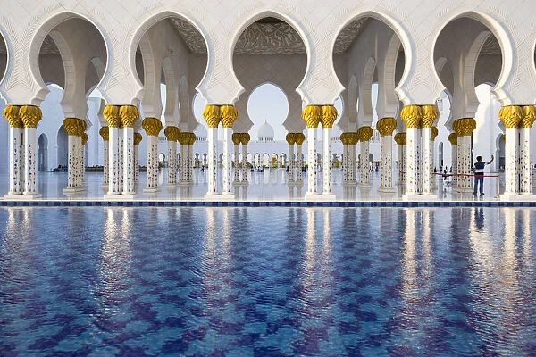 United Arab Emirates, Abu Dhabi. The water pools of Sheikh Zayed Grand Mosque combine