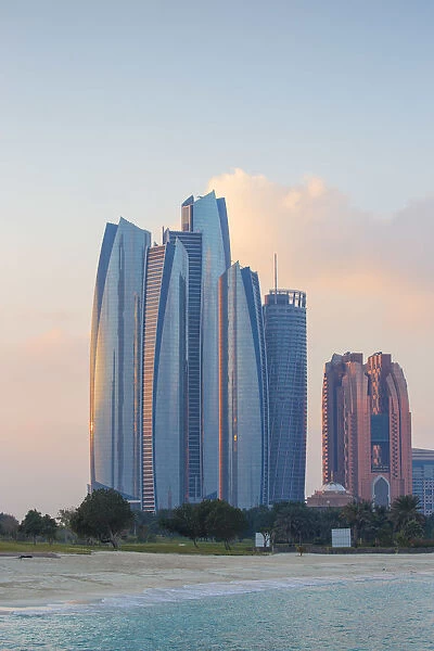 United Arab Emirates, Abu Dhabi, View of Etihad Towers, Grand Hyatt, and Bab Al Aasr