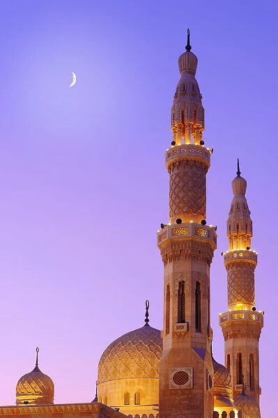 United Arab Emirates, Dubai, Jumeirah Mosque illuminated at duskevening