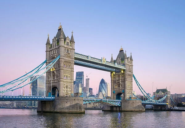United Kingdom, England, London. Tower Bridge over the River Thames and skyline of