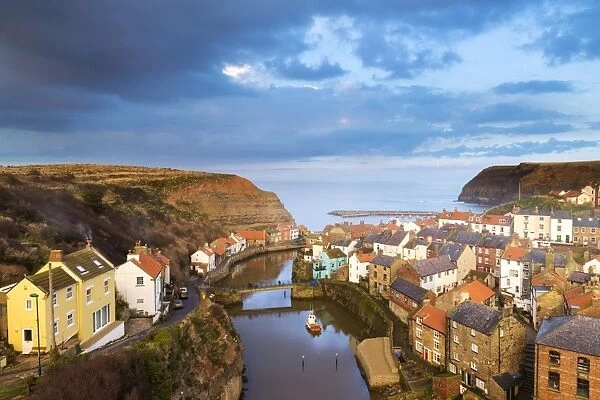 United Kingdom, England, North Yorkshire, Staithes. The sleepy harbour in the evening