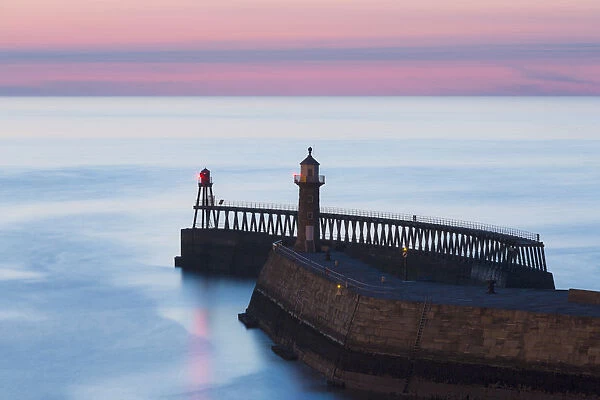 United Kingdom, England, North Yorkshire, Whitby. The East Pier at dusk