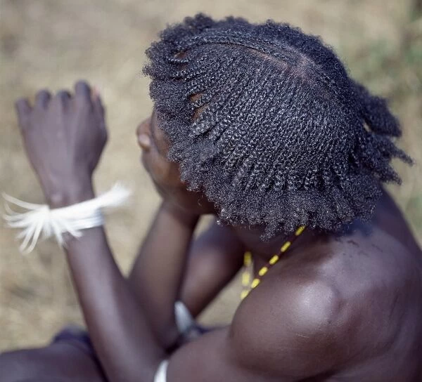 An unusual braided hairstyle of a Dassanech young man