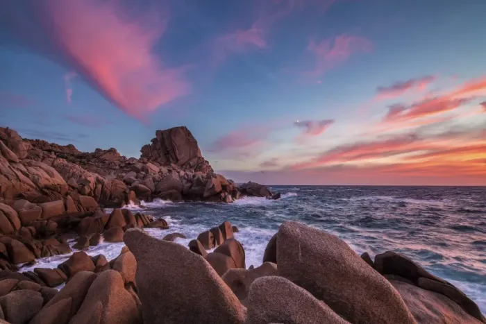 Framed Print : The unusual shapes of the rocks of Capo Testa painted by a wonderful sunset. Sardinia