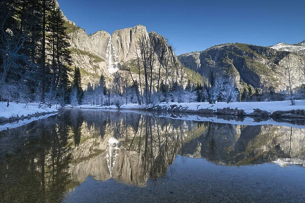 Upper Yosemite Falls Reflecting in Merced River in Winter, Yosemite National Park, California, USA