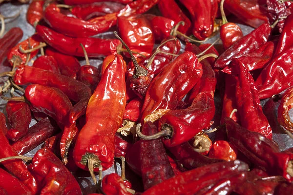 Ura, Bhutan. Red chilli peppers drying in the sun
