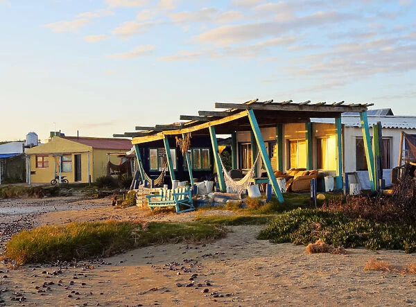Uruguay, Rocha Department, Cabo Polonio, Bungalow on the beach at sunrise