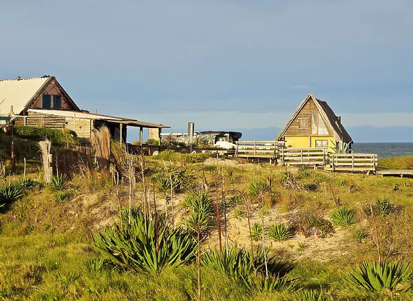 Uruguay, Rocha Department, Punta del Diablo, Houses near la Viuda Beach