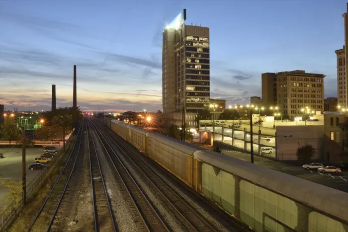 Framed Print : USA, Alabama, Birmingham, train tracks in downtown at dusk